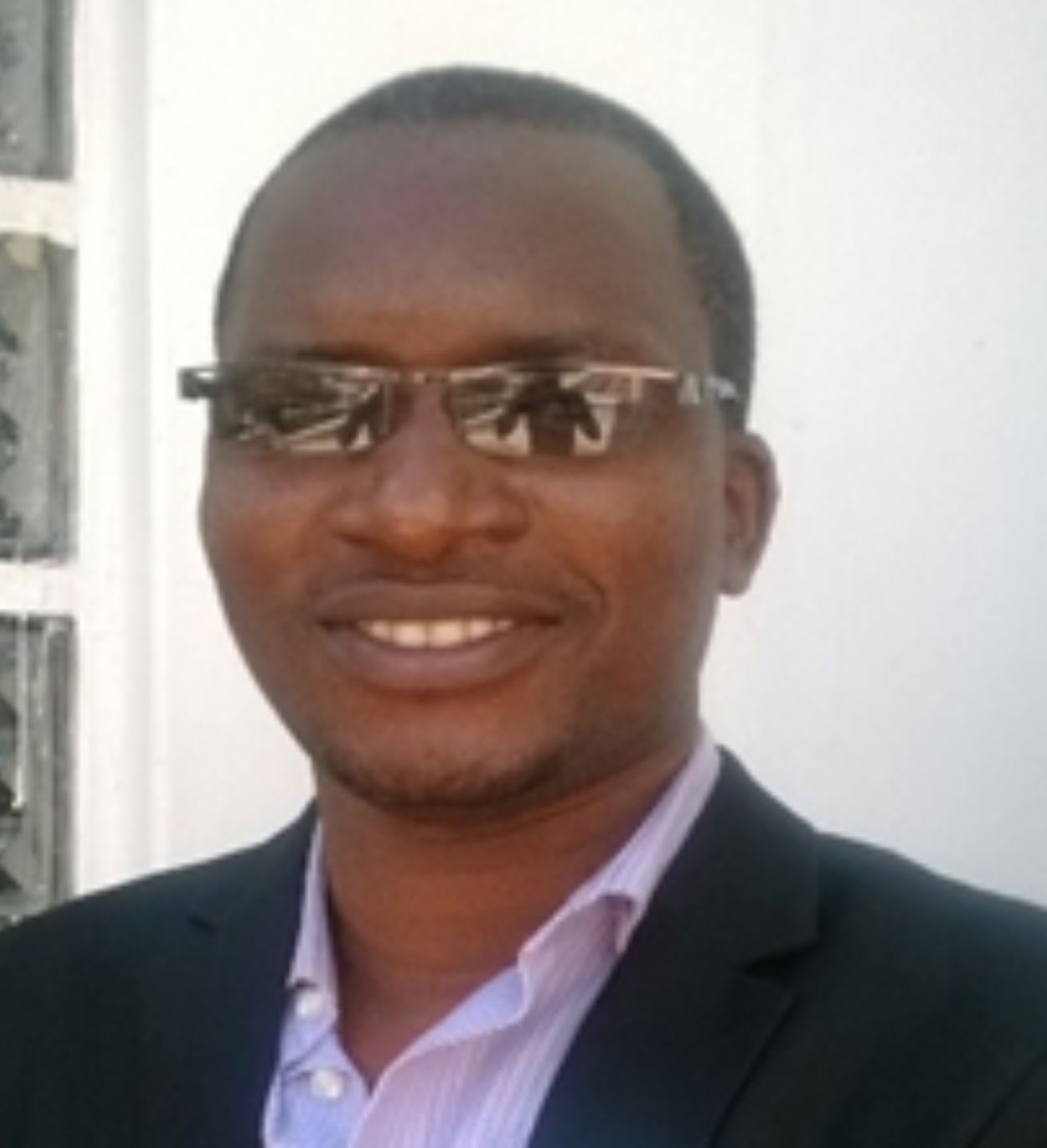Dr. ORESTO MICHAEL MUNISHI 